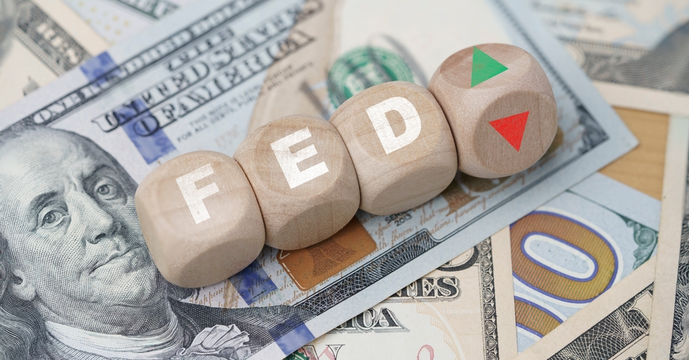 Fed Hikes Rates, Markets React